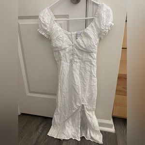 Fitted white midi length dress